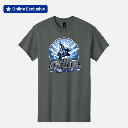 A gray crewneck t-shirt featuring a circular graphic of a fighter jet flying through clouds with the text 'PROUD AIRFORCE BROTHER' in blue and white. The t-shirt is displayed on a light gray background with a blue 'Online Exclusive' banner in the top-left corner.