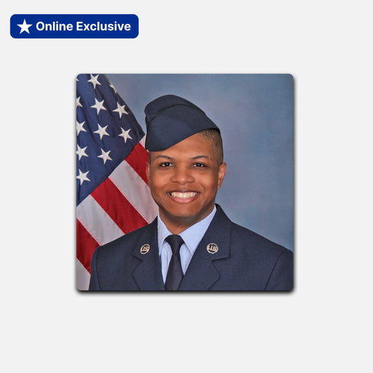 Airman posing next to an American flag with 'Online Exclusive' label.